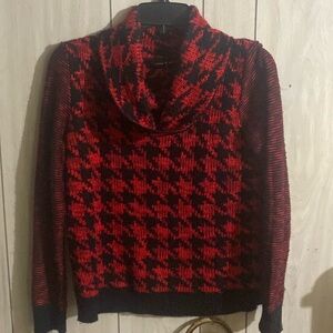 Red and black houndstooth turtle neck sweater